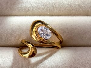 Golden Twist Oval Solitaire Ring